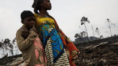 Photo of CHILDREN FLEE FROM THE VOLCANO IN RWANDA