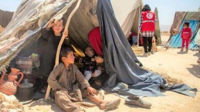 Photo of People in Afghanistan wait for help